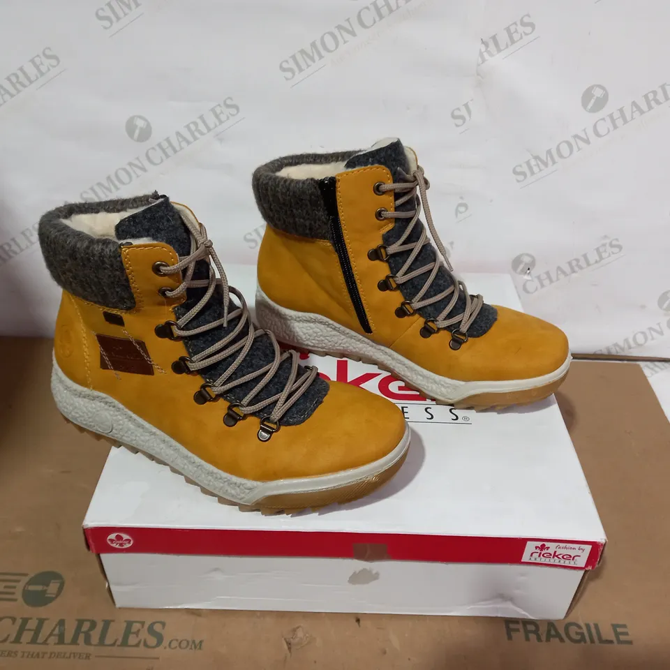 BOXED PAIR OF RIEKER BOOTS- SIZE 39