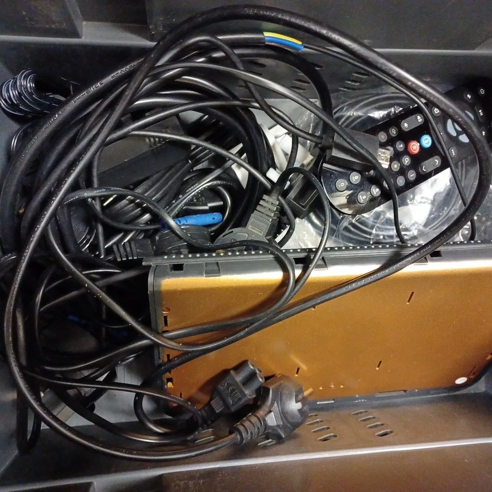 BOX OF APPROX 18 ASSORTED CABLES AND REMOTES TO INCLUDE AC/DC ADAPTER, BT REMOTE, SKY REMOTE, ETC. 