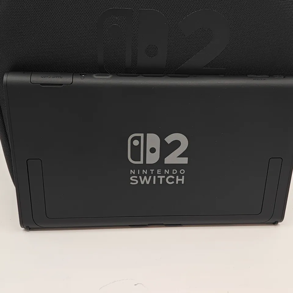 NINTENDO SWITCH 2 HANDHELD GAMES CONSOLE WITH ACCESSORIES AND ALL-IN-ONE CARRY CASE AND 1 GAME