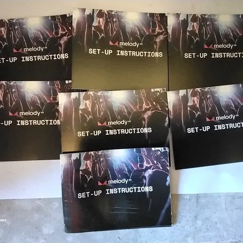 PALLET OF APPROXIMATELY 19 BOXES OF 2000 A7 LANDSCAPE 6-PAGE LEAFLETS MELODY VR SET-UP INSTRUCTIONS