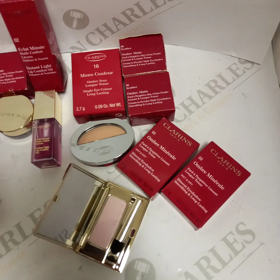 LOT OF APPROX 10 TO INCLUDE CLARINS MATTE EYESHADOW , CLARINS INSTANT LIGHT LIP OIL , ETC