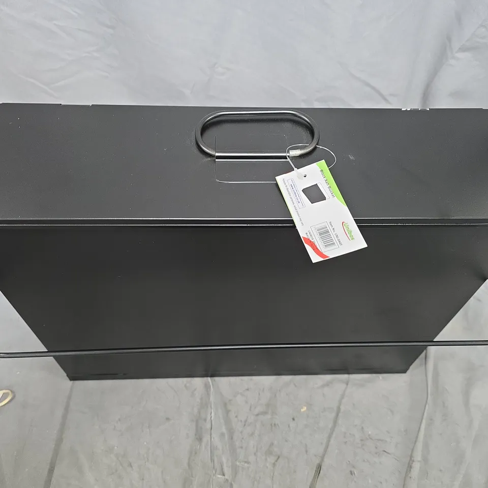 Black storage box with lid on metal frame coffee table stand
