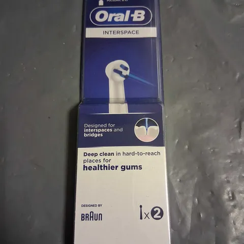 SIX PACKS OF TWO ORAL-B INTERSPACE BRUSH HEADS