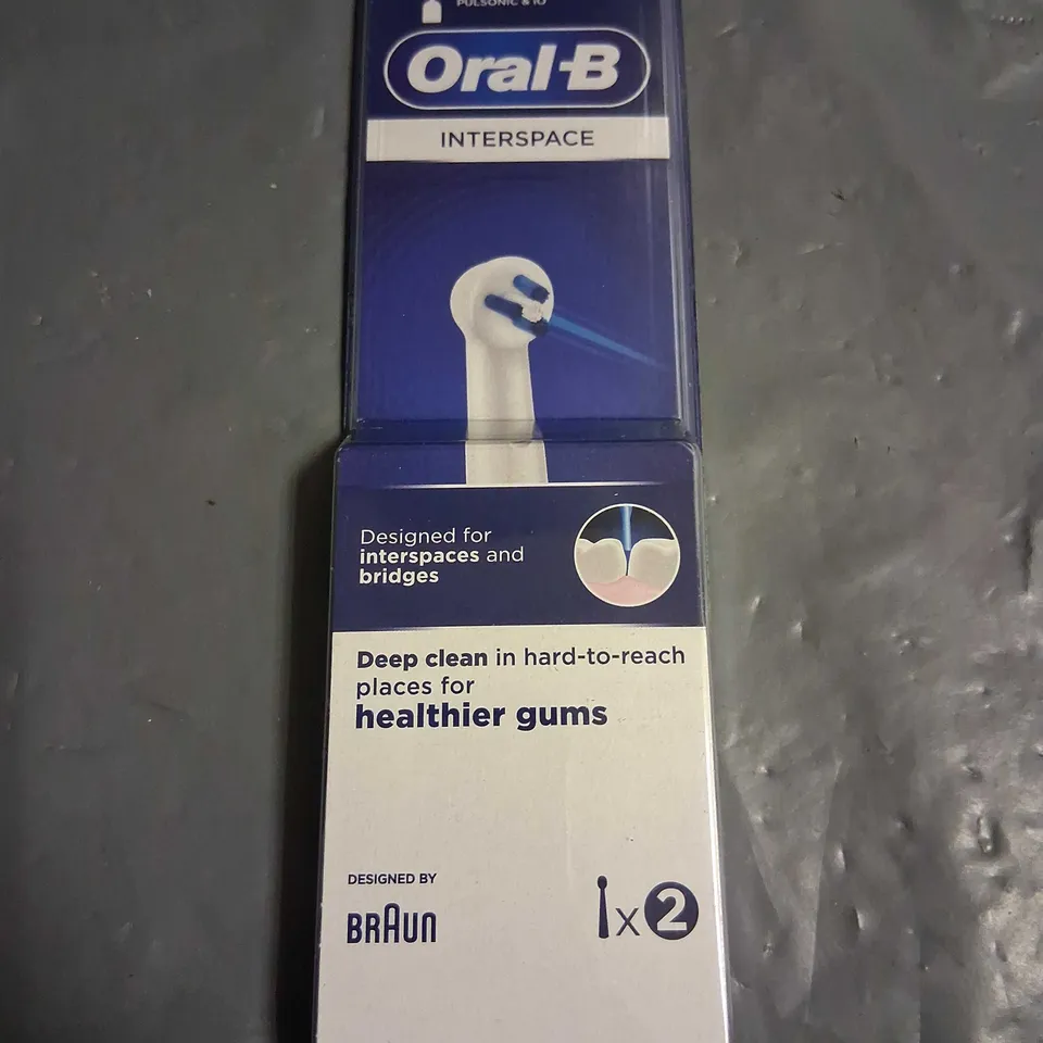 SIX PACKS OF TWO ORAL-B INTERSPACE BRUSH HEADS