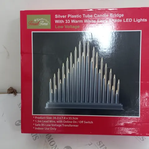 SEALED AND BOXED TINSEL SILVER PLASTIC TUBE CANDLE BRIDGE 