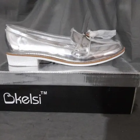 APPROXIMATELY 10  BOXED PAIRS OF KELSI SILVER SLIP ON SILVER LOAFERS IN VARIOUS SIZES INCLUDING SIZE  4/5/6/7 