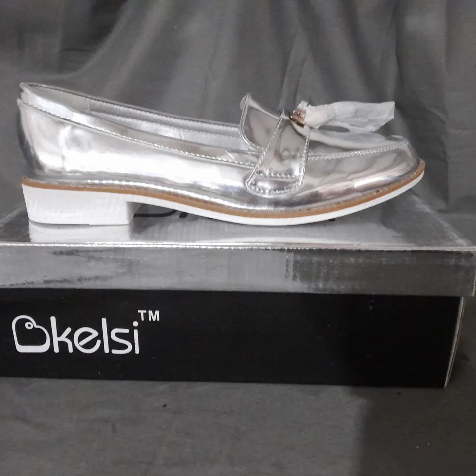 APPROXIMATELY 10  BOXED PAIRS OF KELSI SILVER SLIP ON SILVER LOAFERS IN VARIOUS SIZES INCLUDING SIZE  4/5/6/7 