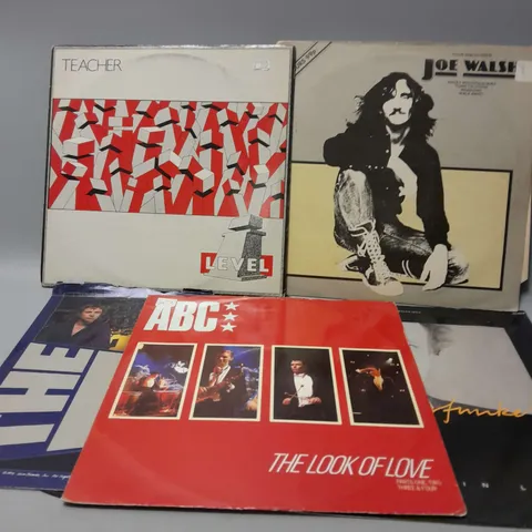 10 ASSORTED VINYL RECORDS TO INCLUDE THE HUMAN LEAGUE MIRROR MAN, SOFT CELL TAINTED LOVE, A FLOCK OF SEAGULLS (ITS NOT ME) TALKING, ETC
