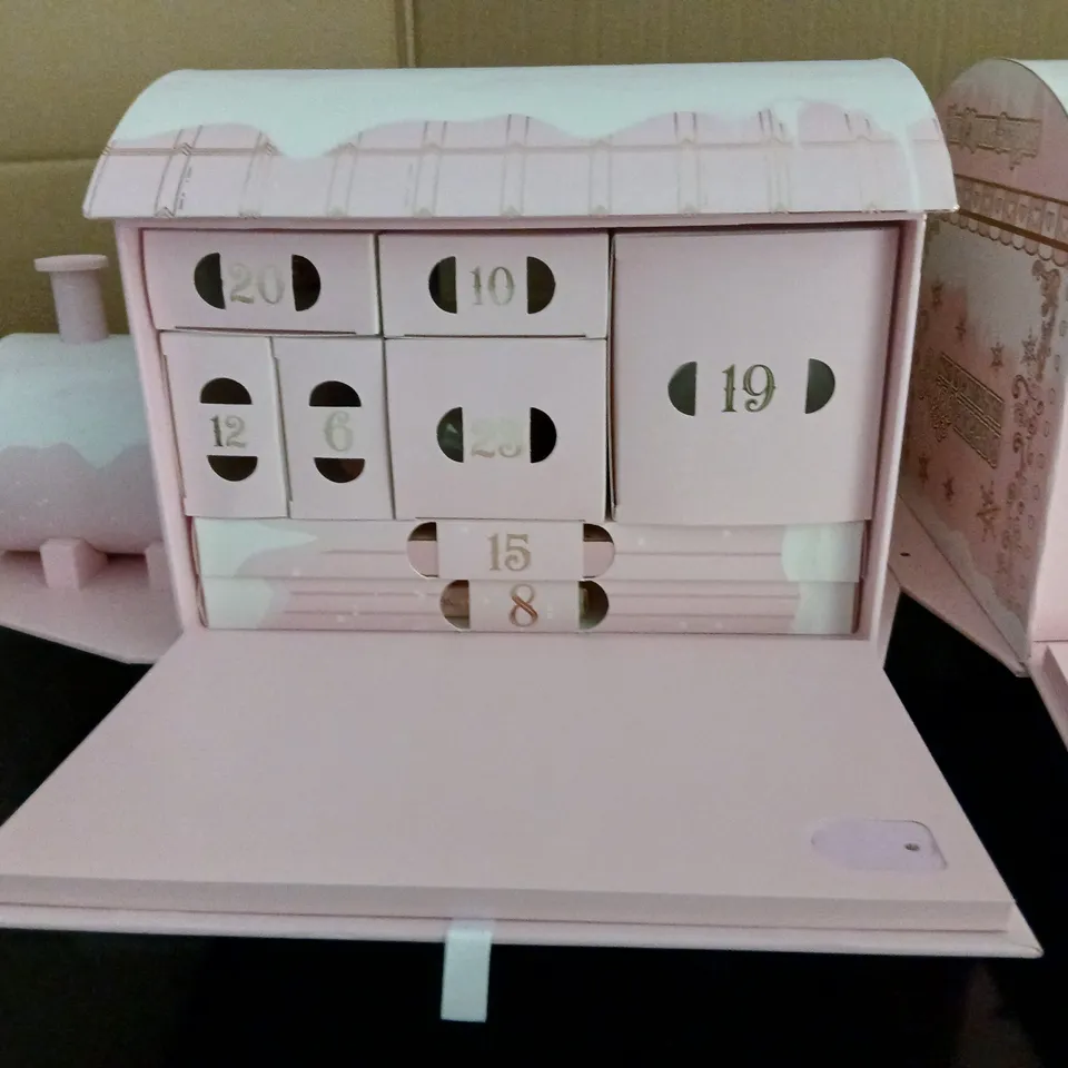 P.LOUISE EXPRESS ADVENT CALENDAR TRAIN – PINK COSMETIC CALENDAR (FRAGILE)