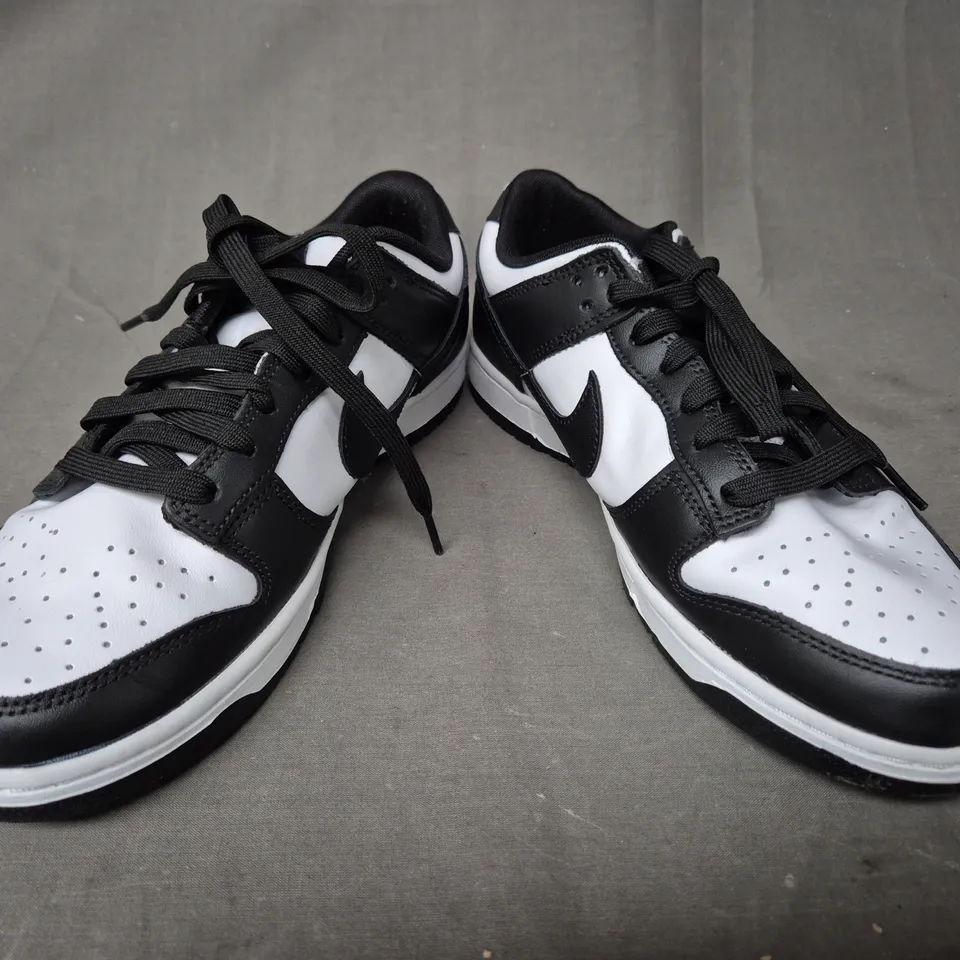 PAIR OF NIKE SHOES IN BLACK/WHITE UK SIZE 8