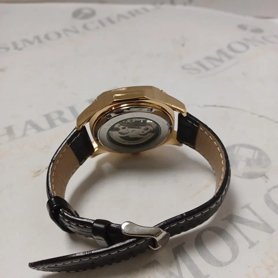 MEN’S TALIS CO 9185 AUTOMATIC SKELETON WATCH – BLACK DIAL – GOLD COLOUR CASE – GLASS EXHIBITION CASE BACK – LEATHER STRAP