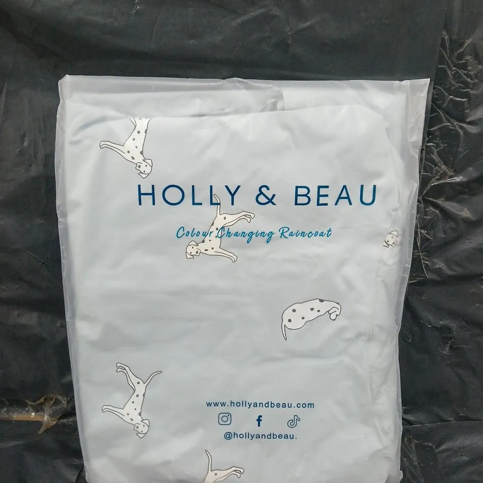 BAGGED HOLLY AND BEAU DALMATIAN RAIN COAT - SIZE M - COLOUR CHANGING 