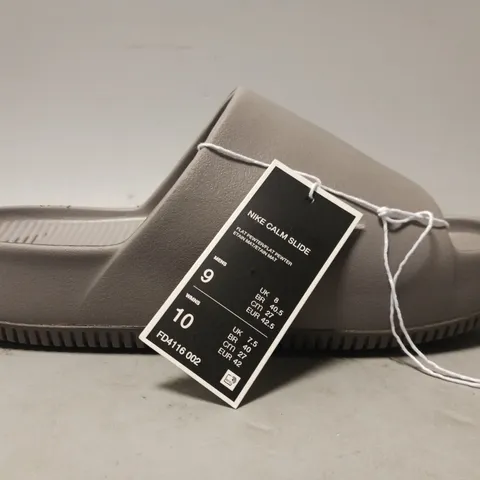 PAIR OF NIKE CALM SLIDERS IN GREY UK SIZE M8/W7.5