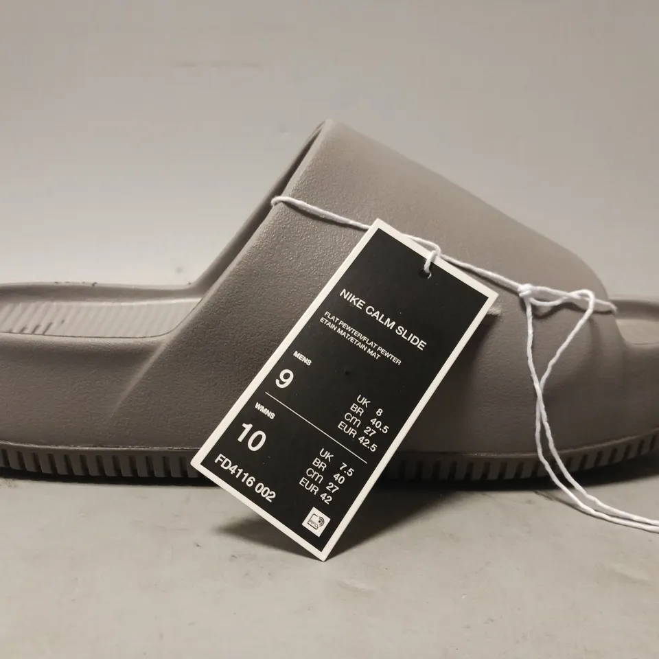 PAIR OF NIKE CALM SLIDERS IN GREY UK SIZE M8/W7.5