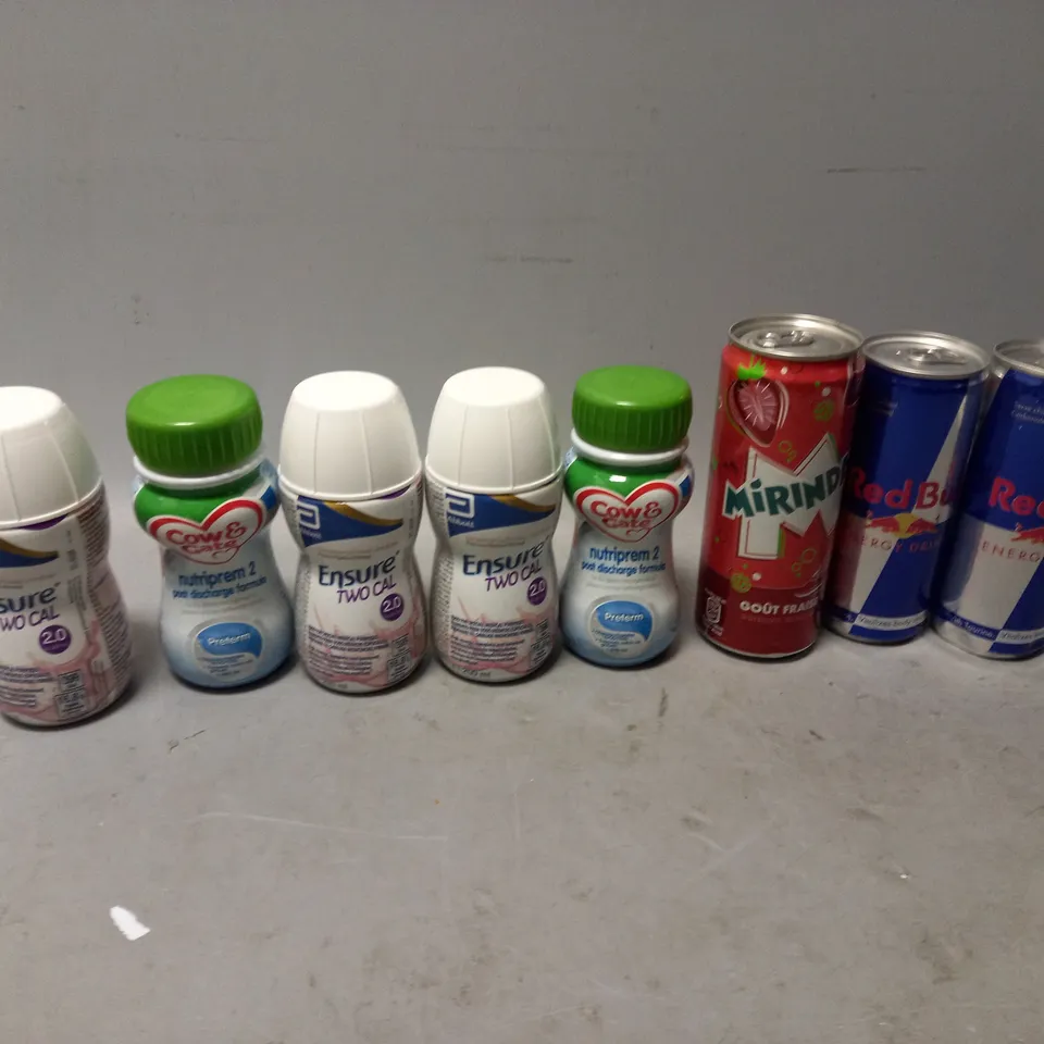 LOT OF APPROXMATELY 16 DRINKS TO INCLUDE REDBULL, ENSURE, MIRANDA, AND NUTRIPREM ETC. 