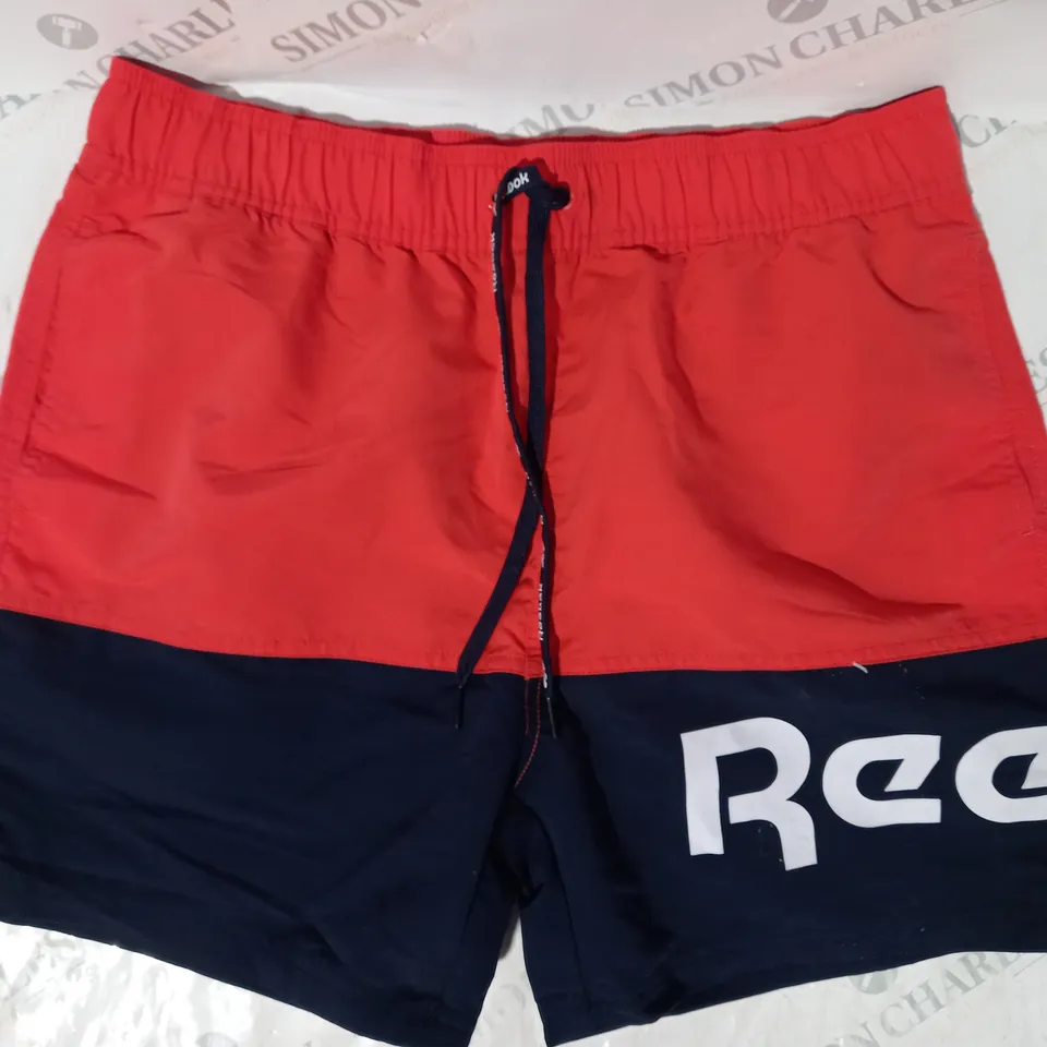 REEBOK SWIM SHORTS IN RED/NAVY SIZE M