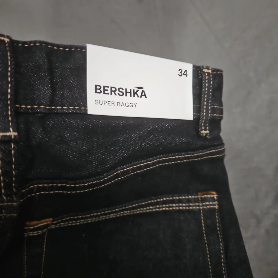 BERSHKA SUPER BAGGY JEANS – UK 28