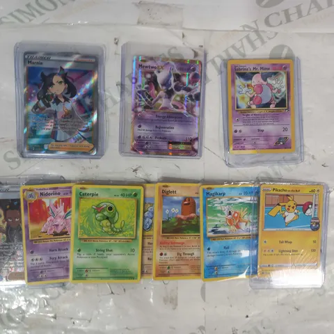 LOT OF ASSORTED POKΓMON TRADING CARDS