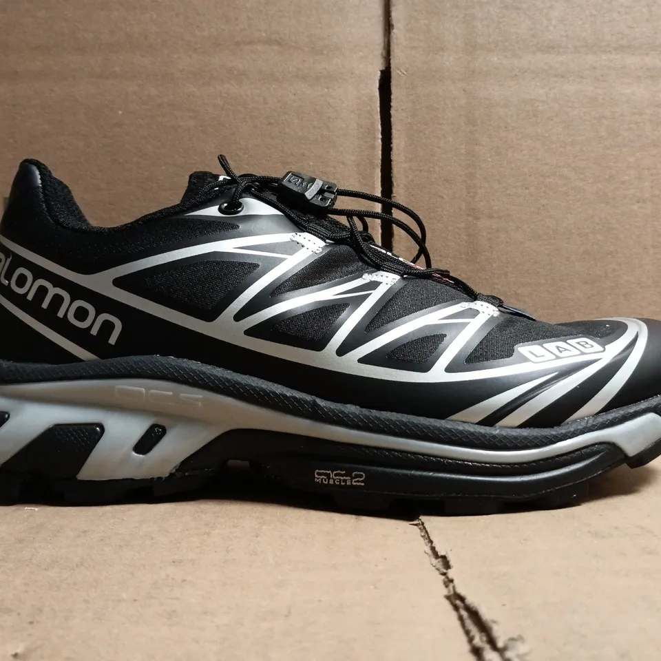 salomon trainers in black/sillver size uk 5