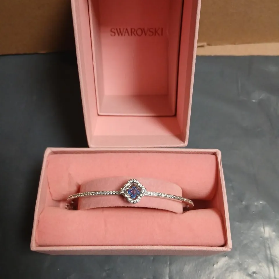 SWAROVSKI CRYSTAL BRACELET WITH BLUE CENTER STONE IN HALO – PINK BOX