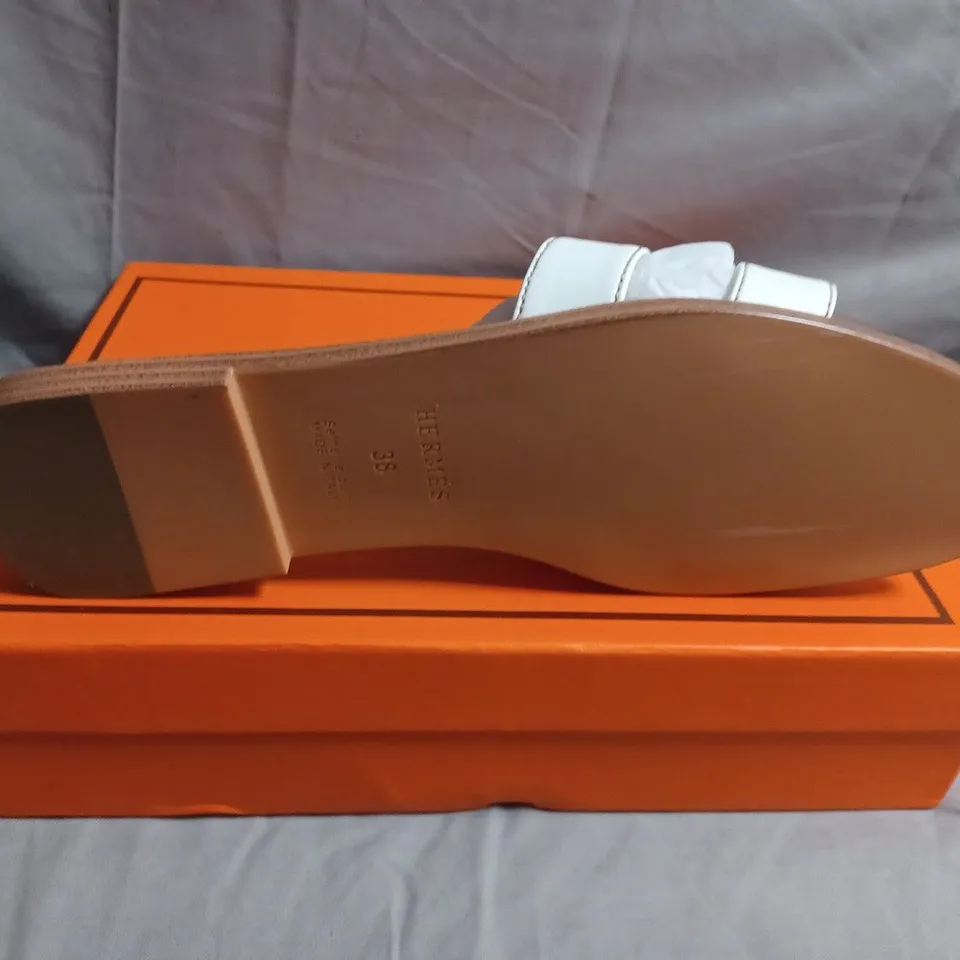 BOXED PAIR OF HERMÈS PARIS WHITE LEATHER ORAN SANDALS – SIZE 36