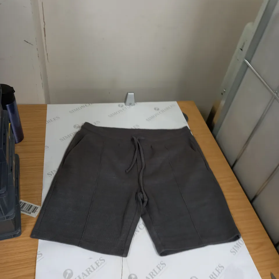 BOX OF ASSORTED CLOTHING ITEMS TO INCLUDE TOPS, SHORTS, TOPS, HANDBAGS ETC