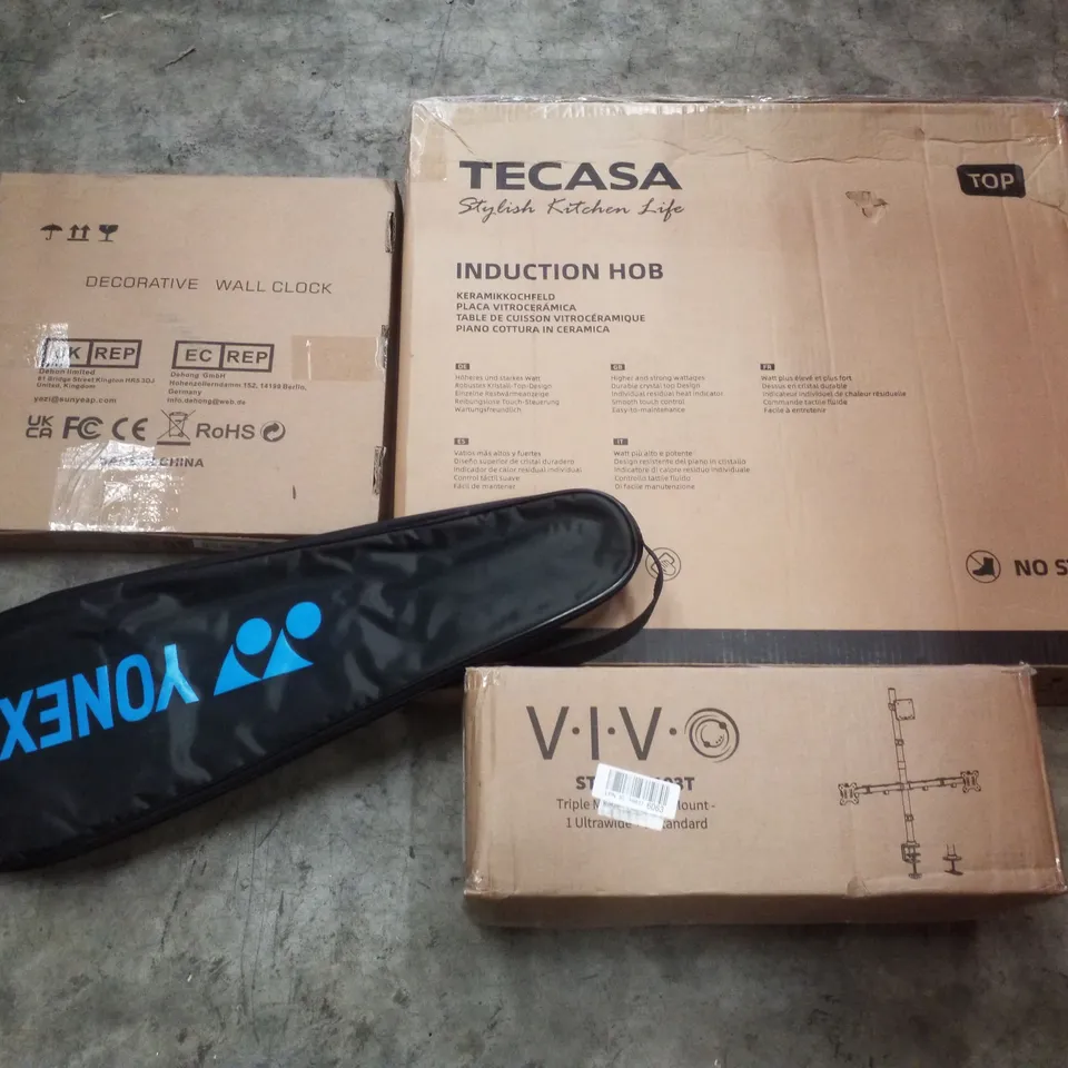 PALLET CONTAINING ASSORTED PRODUCTS INCLUDING DECORATIVE WALL CLOCK, INDUCTION HOB, BADMINTON RACKET & TRIPLE MONITOR DESK MOUNT