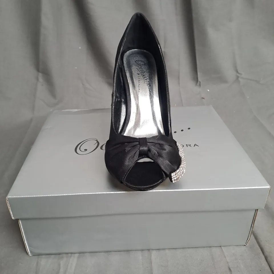 BOXED LOT OF 12 PAIRS OF LADIES OCCASIONS BY CASANDRA BLACK HIGH HEELED SHOES VARIOUS SIZES