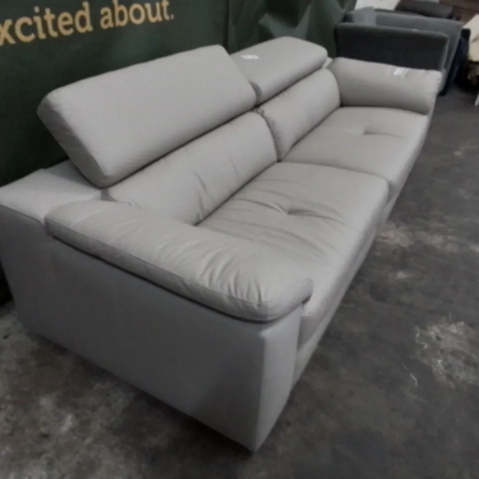 DESIGNER FAUX LEATHER THREE SEATER SOFA WITH ADJUSTABLE HEADRESTS