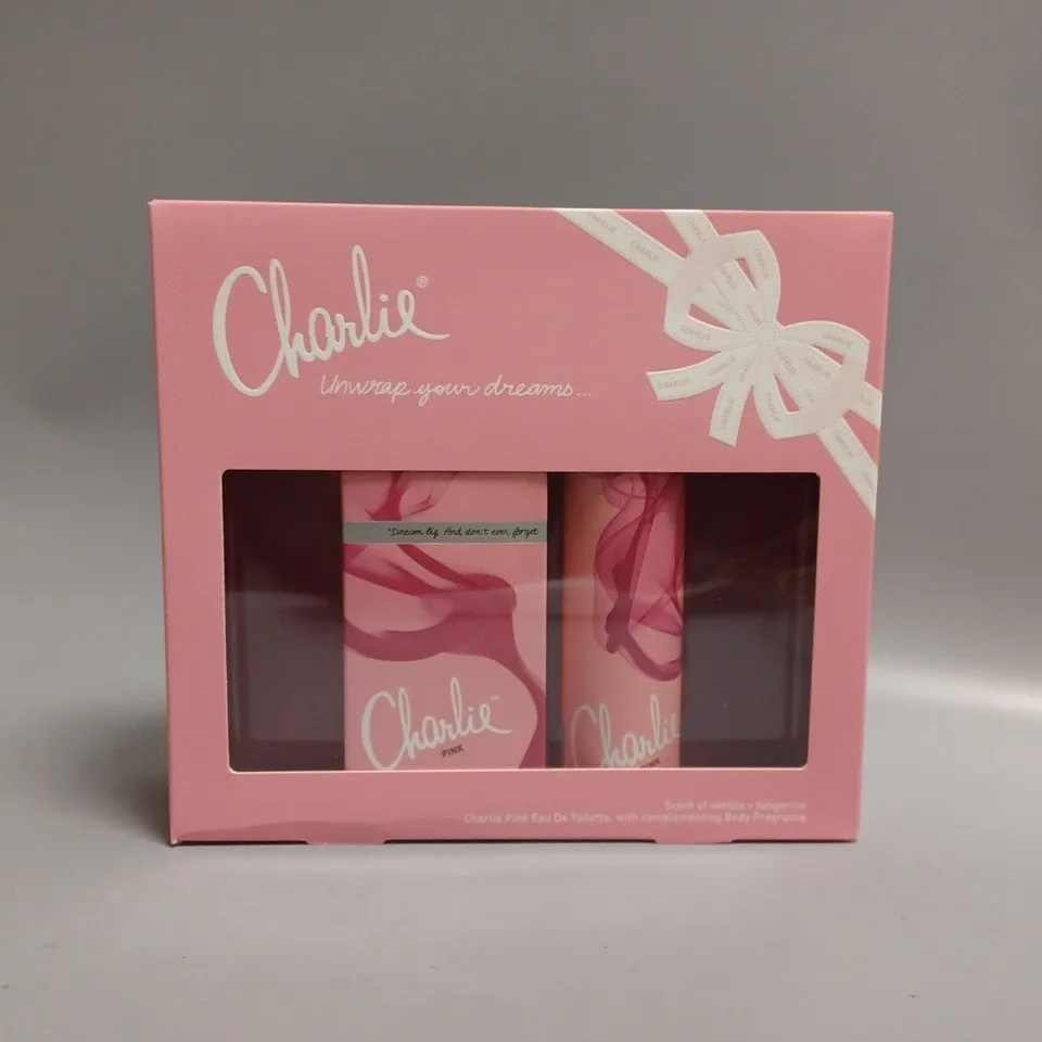 APPROXIMATELY 6 BOXED AND SEALED REVLON CHARLIE UNWRAP YOUR DREAMS GIFT SET TO INCLUDE CHARLIE PINK EAU DE TOILETTE AND CHARLIE PINK BODY FRAGRANCE