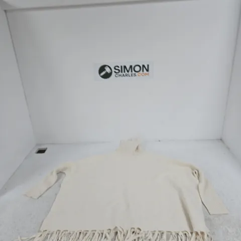 APRICOT CREAM TURTLE NECK PONCHO STYLE JUMPER WITH TASSLES SIZE M