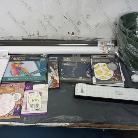 CAGE OF ASSORTED HOUSEHOLD GOODS TO INCLUDE WATERCOLOUR PENCILS, WATERCOLOUR CARD, POSTER DISPLAY ROLL, AND MAGNER IRISH CIDER ICE BUCKET ETC.