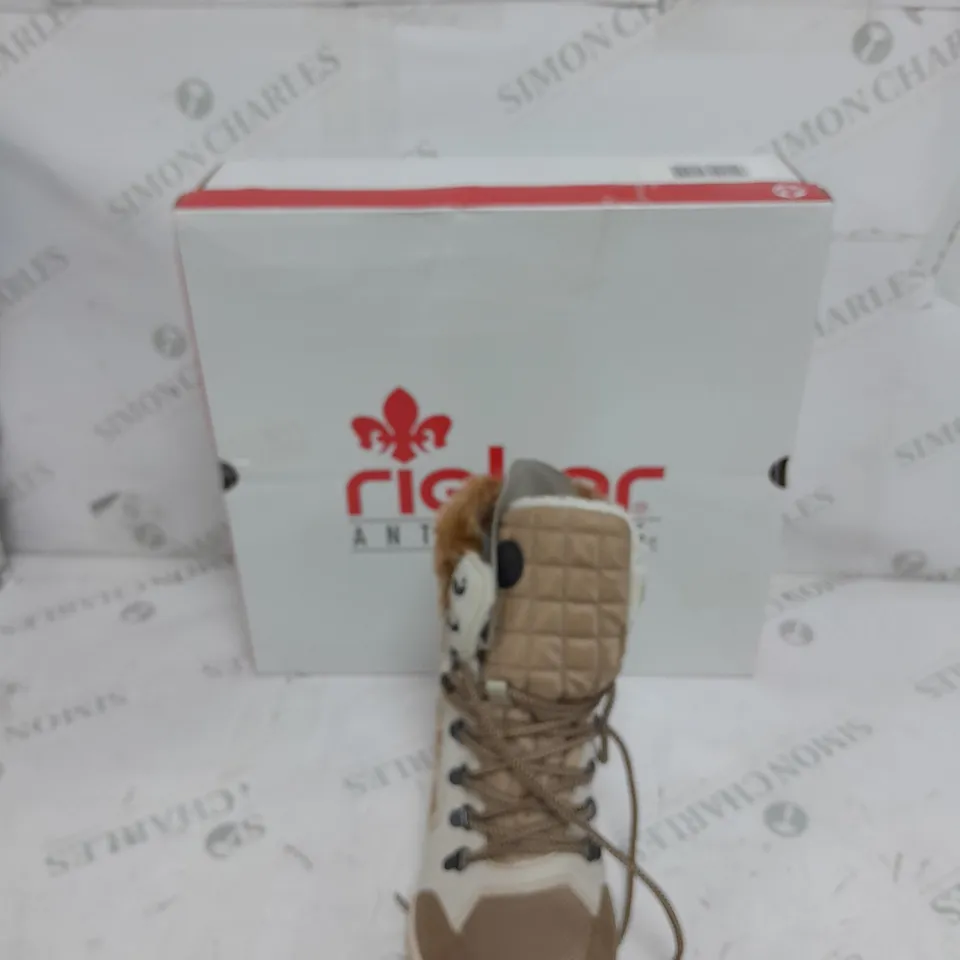 BOXED PAIR OF RIEKER CREAM WINTER FUR HIKE BOOTS IN SIZE 5 