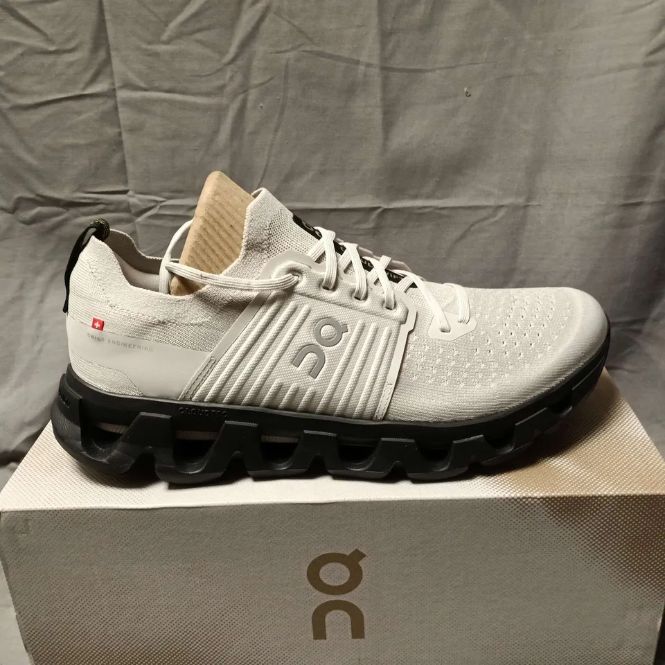 BOXED PAIR OF ON CLOUDSWIFT 4 TRAINERS IN WOLF/BLACK - UK 10.5