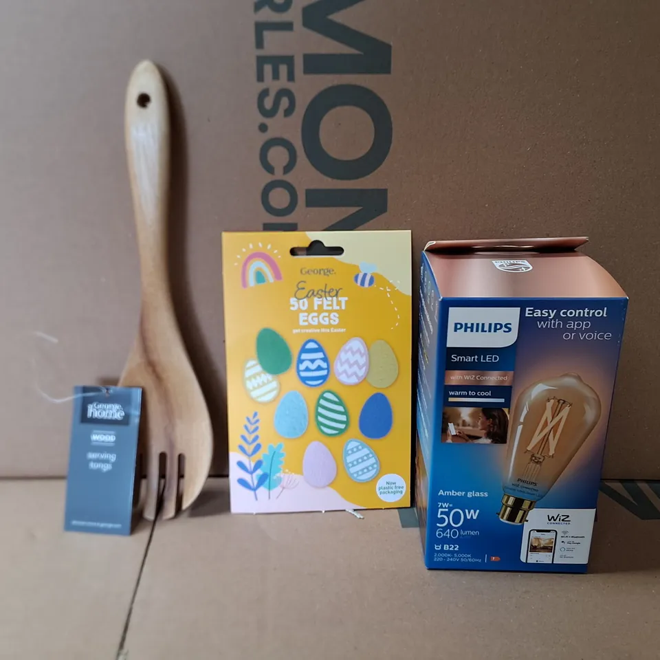 BOX OF APPROXIMATELY 20 ASSORTED ITEMS TO INCLUDE - PHILIPS 50W LIGHT BULB,  EASTER 50 FELT EGGS , SERVING TONGS 