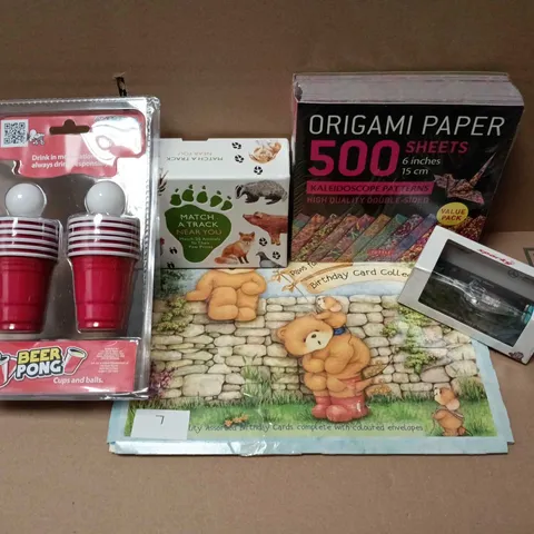 APPROXIMATELY 12 ASSORTED TOYS & GAMES PRODUCTS TO INCLUDE ORIGAMI PAPER, BEER PONG, SPARKY MERCEDES F1 W13 MODEL, ETC