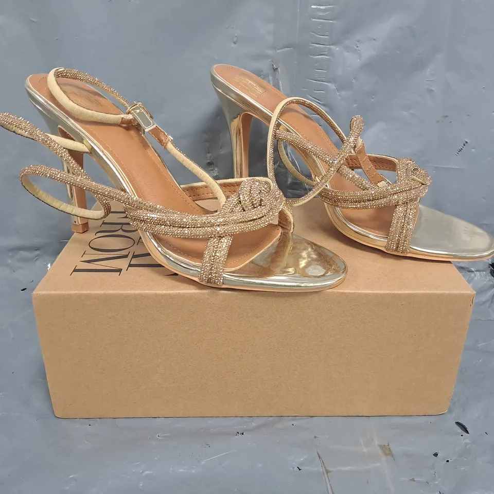 BOXED PAIR OF WHERE'S THAT FROM OPEN TOE STILETTO HEEL SANDAL IN METALLIC GOLD SIZE UK 7