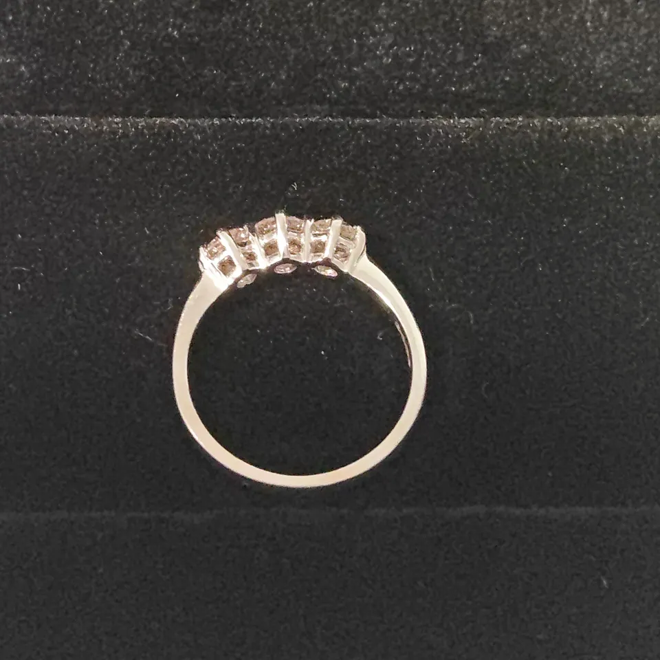 18CT WHITE GOLD THREE STONE RING SET WITH A NATURAL DIAMOND WEIGHING +-1.01CT