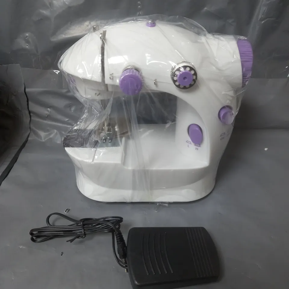 BOXED SM-202A MINI SEWING MACHINE 