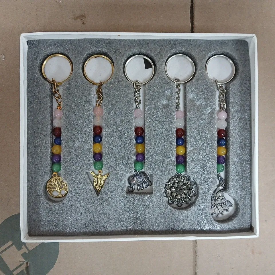 BOX OF APPROXIMATELY 5 X LIVMORE SET OF 5 GEMSTONE KEYCHAINS