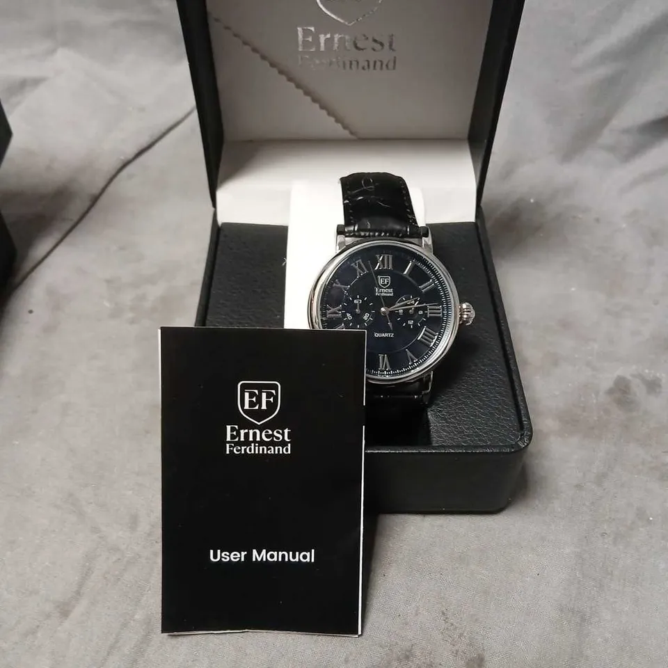 ERNEST FERDINAND QUARTZ WRISTWATCH – BLACK DIAL, ROMAN NUMERALS, LEATHER STRAP – BOXED