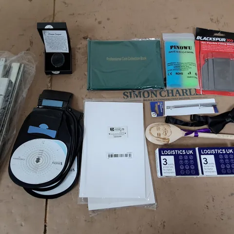APPROXIMATELY 10 ASSORTED HOUSEHOLD ITEMS TOO INCLUDE FLEXIBLE FILLING BLADES, OCEAN JASPER GEM, AND PROFESSIONAL COIN COLLECTION BOOK ETC.  
