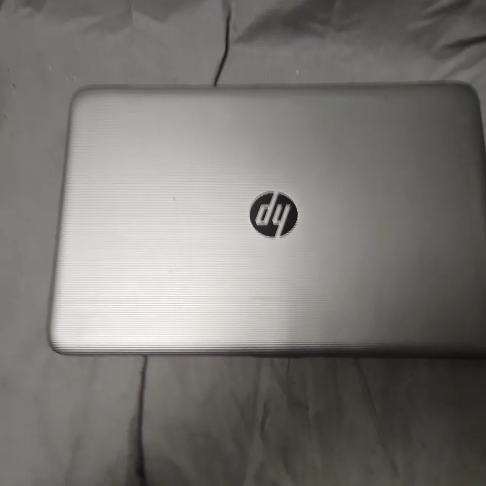 HP LAPTOP COMPUTER – SILVER (TPN-C125)