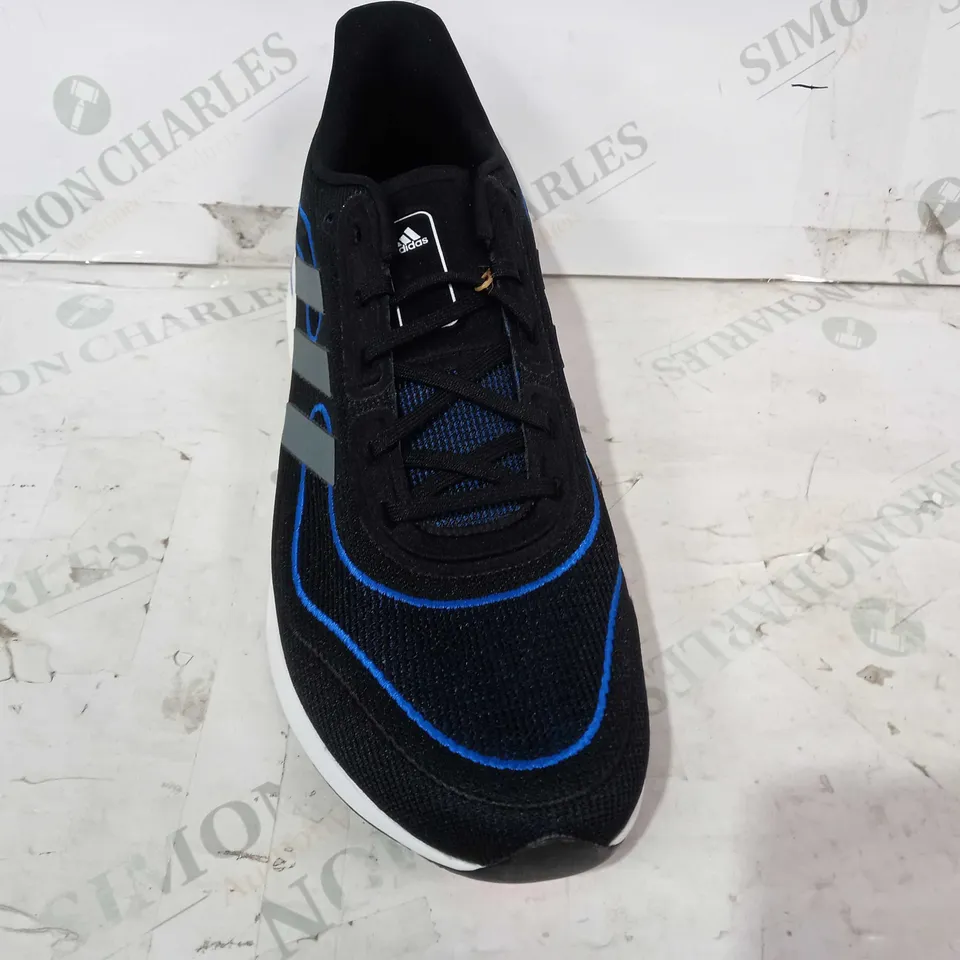 BOXED PAIR OF ADIDAS SUPERNOVA SHOES IN BLACK/BLUE UK SIZE 11