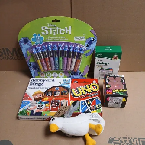 TOTE OF APPROXIMATELY 20 ASSORTED TOYS/RELATED ITEMS TO INCLUDE DISNEY STITCH 10 PIECE LIP GLOSS SET, GCSE BIOLOGY QUESTION CARDS, BARNYARD BINGO, UNO CARDS, SOFT TOY ETC