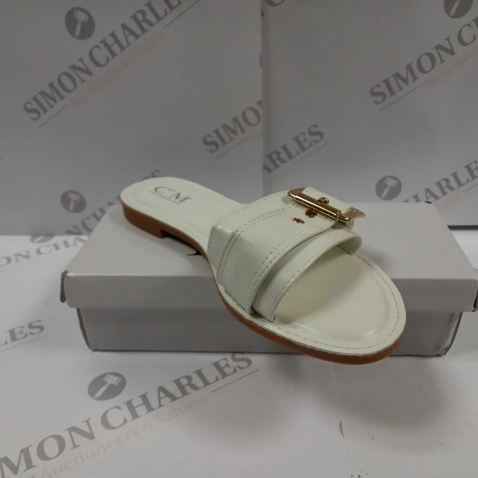 BOXED PAIR OF C'M PARIS FLAT SANDALS IN WHITE UK SIZE 5 