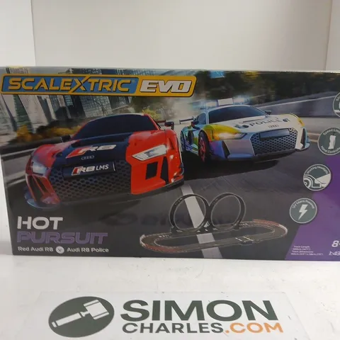 SCALEXTRIC EVO HOT PURSUIT SLOT CAR RACE SET – BOXED (2 CARS: RED AUDI RS Q8 & AUDI R8 POLICE)