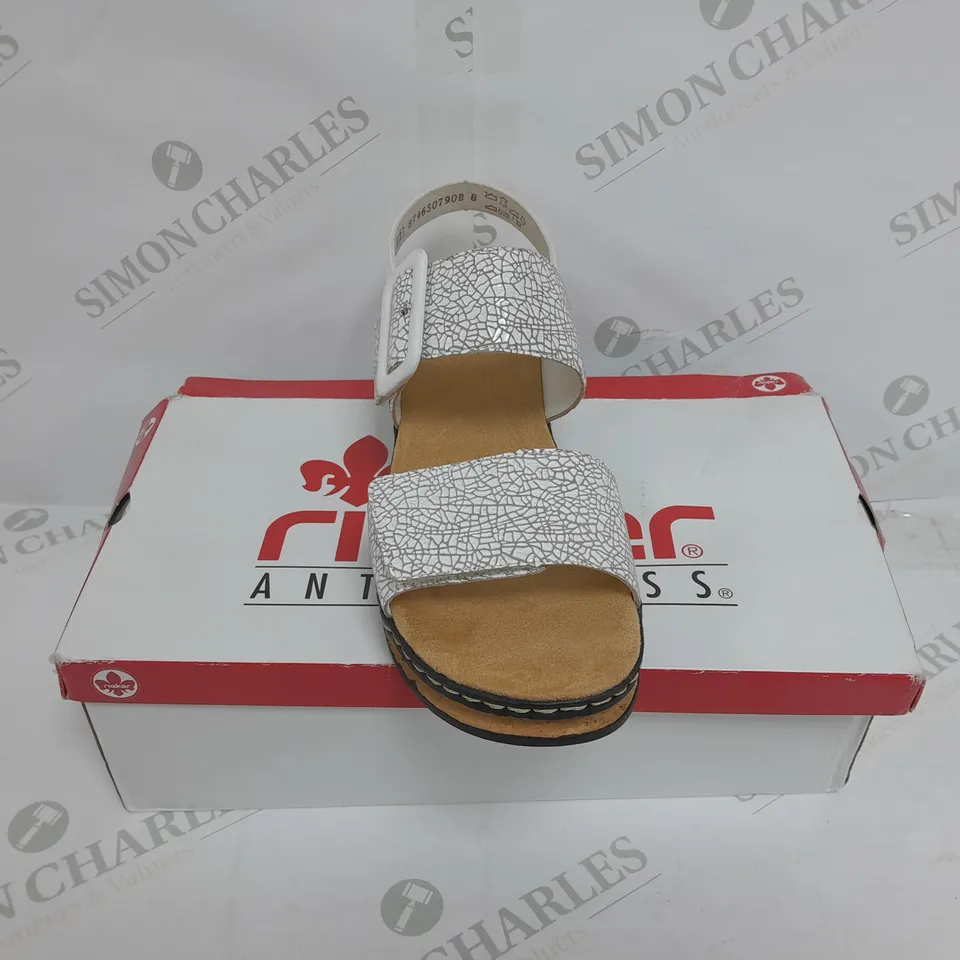 BOXED PAIR OF RIEKER WEDGE BUCKLE SANDALS IN WHITE SIZE 8 