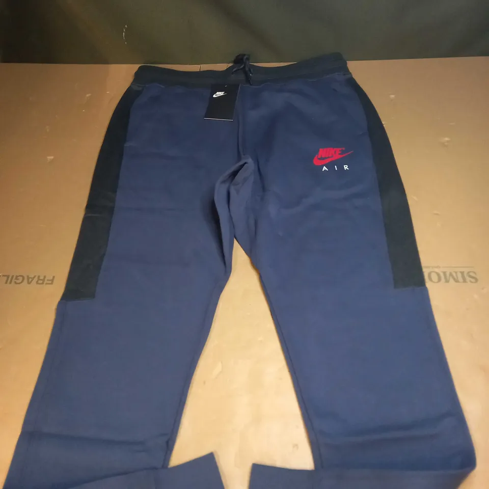NIKE AIR TRACKSUIT BOTTOMS SIZE L