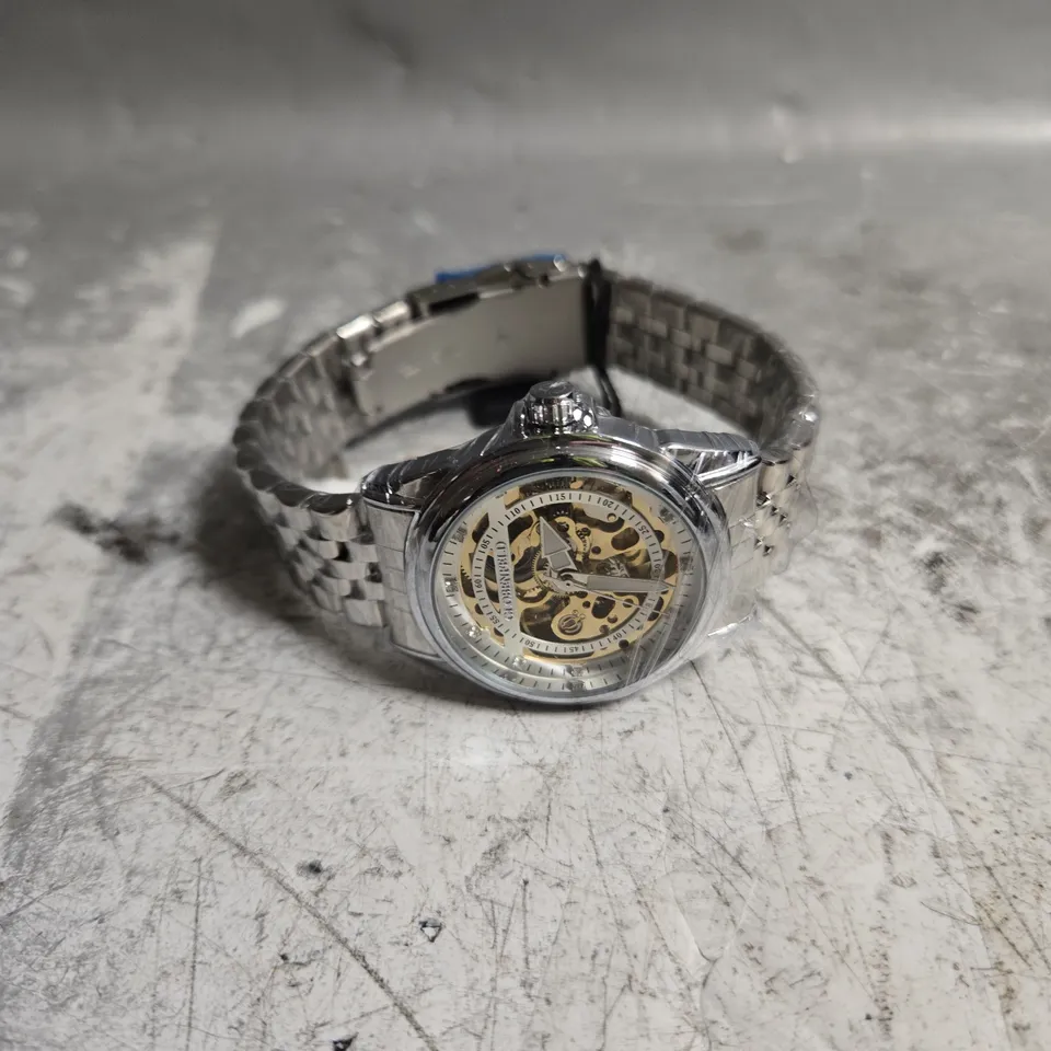 BOXED GLOBENFIELD EXHIBITION DIAL GENTS WATCH WITH SKELETON BACK CASE AND METAL STRAP